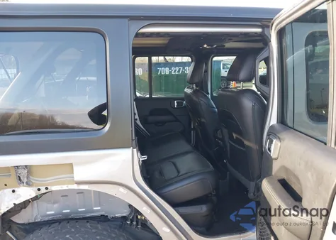 2021 Jeep Wrangler 4Xe Unlimited Sahara 4X4 z USA, uszkodzony, nr VIN 1C4JJXP63MW742836